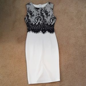 White stretchy dress with black lace top